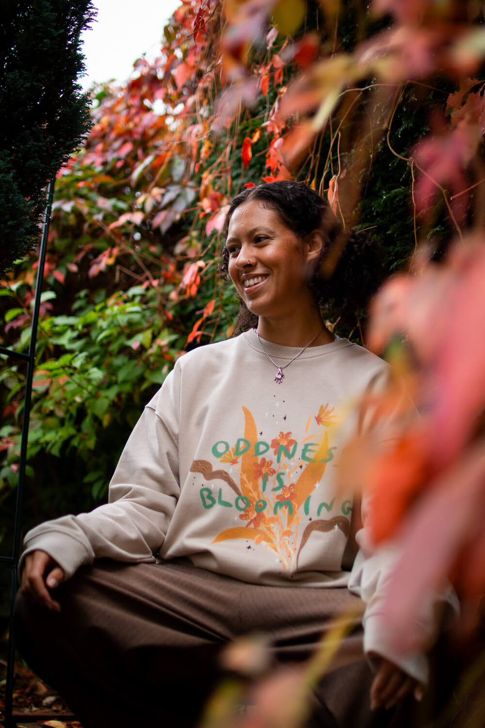 Oddness is blooming, Loose fit collaboration Sweatshirt with Ode to Them